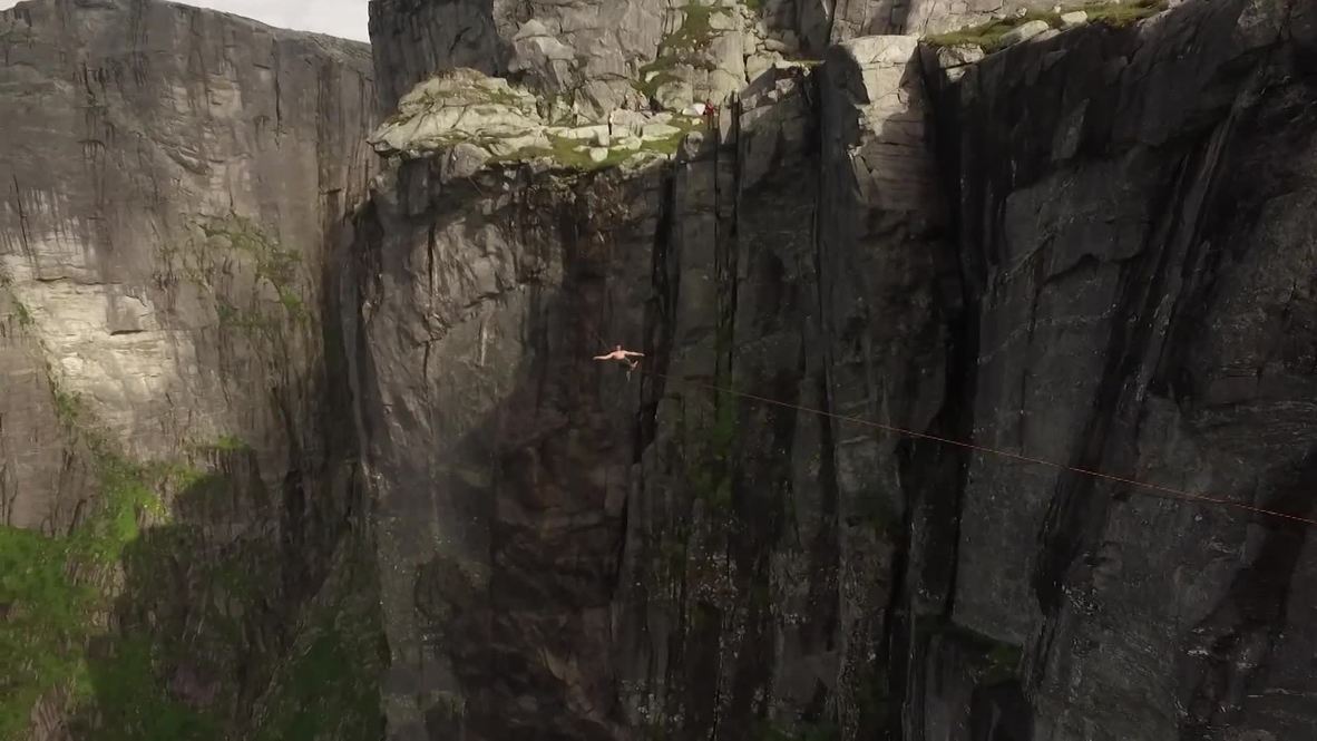 Head for heights? Norwegian daredevil loses it on 1,000m-high tightrope