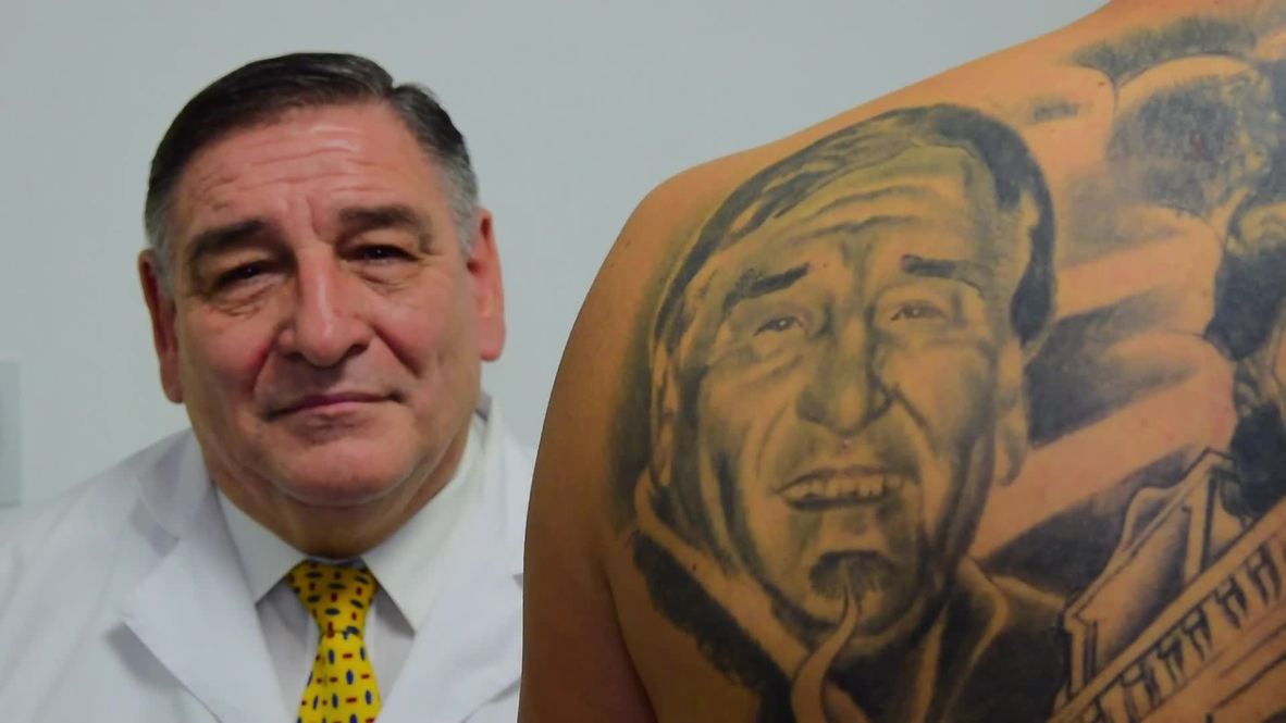 Cancer survivor gets massive tattoo of doctor who cured him