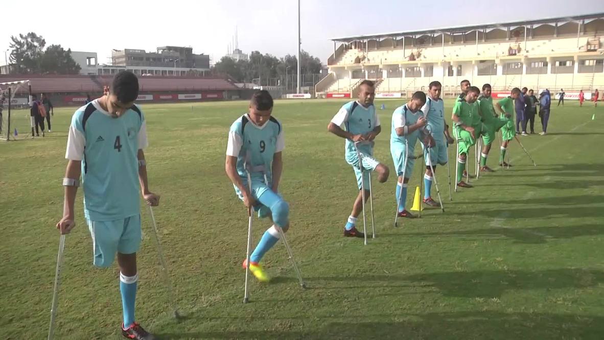 Palestinians wounded by Israeli fire use football to overcome tragedy