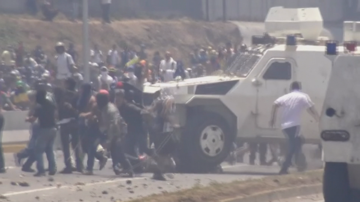 Venezuela: Protesters run over by armoured vehicles during pro-Guaido protest *GRAPHIC*