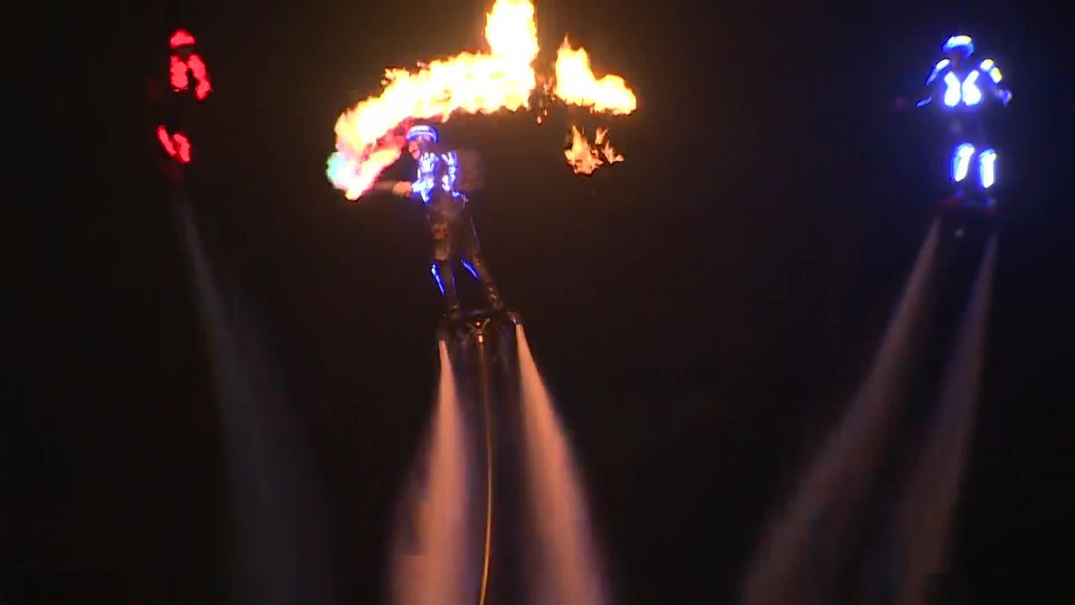 Daredevil-flyboarders hold fire show over Volga river