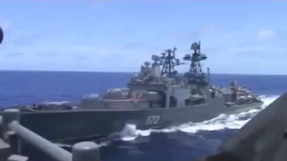 At Sea: Russian and US warships nearly collide in East China Sea