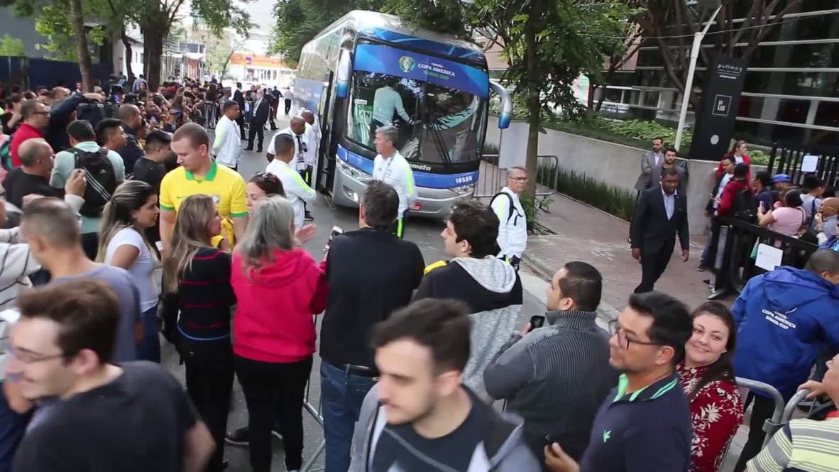 Brazil: Fans cheer on Brazilian team outside hotel ahead of match with Peru
