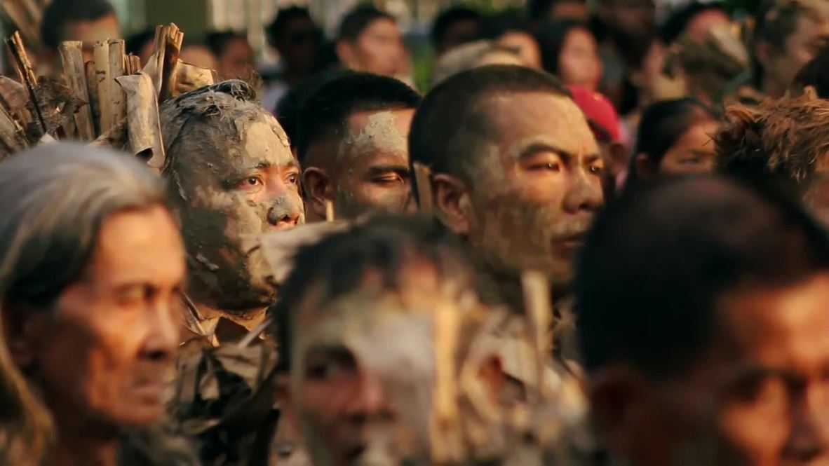Filipinas: Cientos de 'Hombres de barro' conmemoran a San Juan Bautista