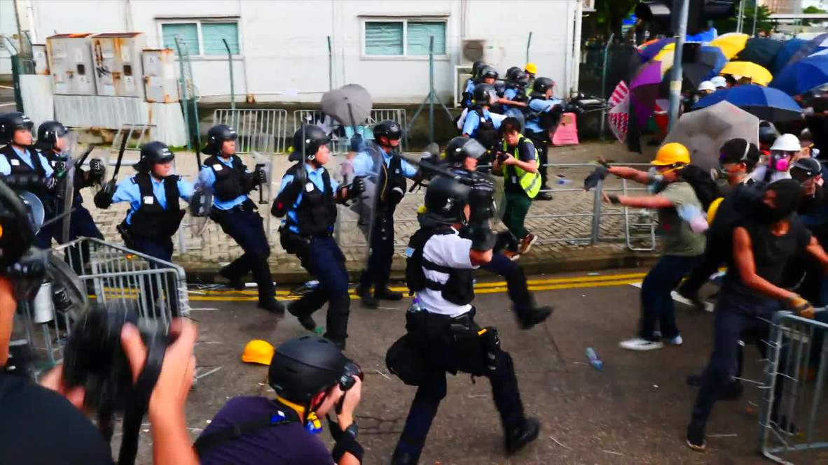 Hong Kong: Protesters clash with police on anniversary of Hong Kong's handover to China