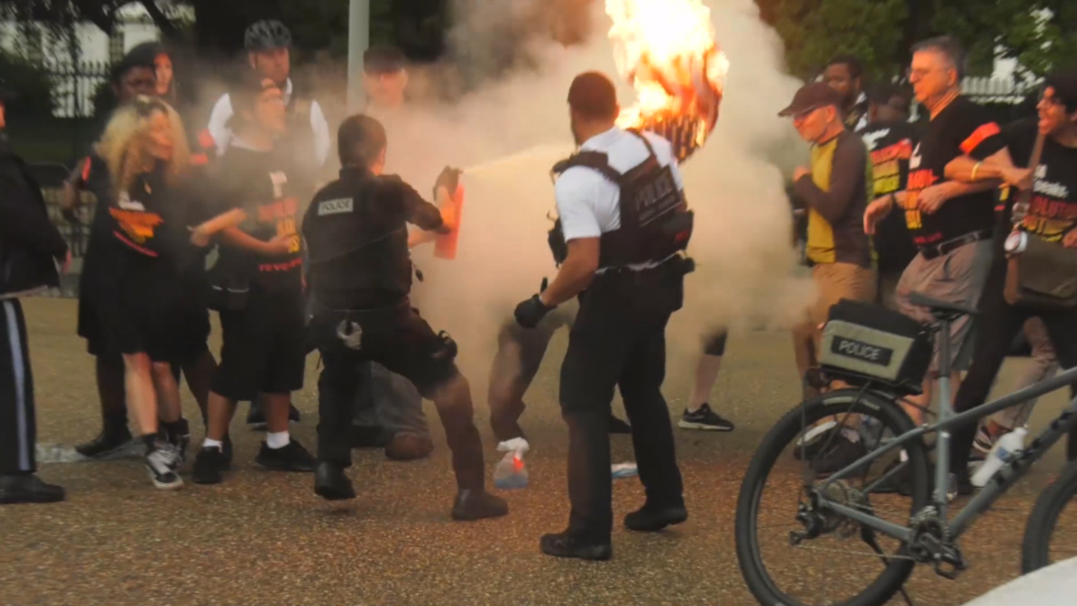 USA: Flag burning at White House before Trump's military parade