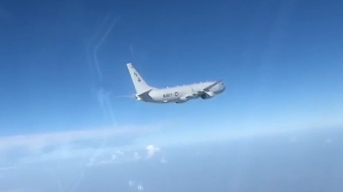 At Sea: Russian Su-27 jet intercepts US surveillance plane over Black Sea