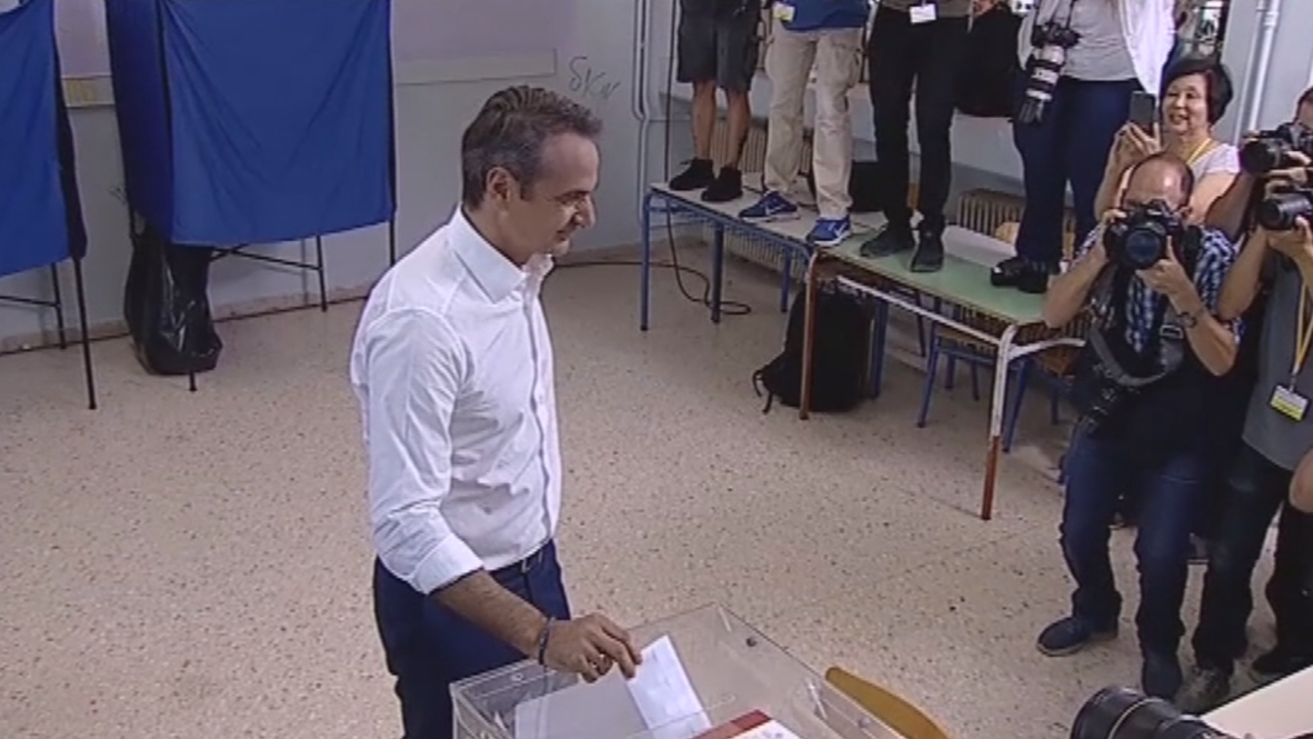 Greece: New Democracy's Mitsotakis casts vote in snap general election