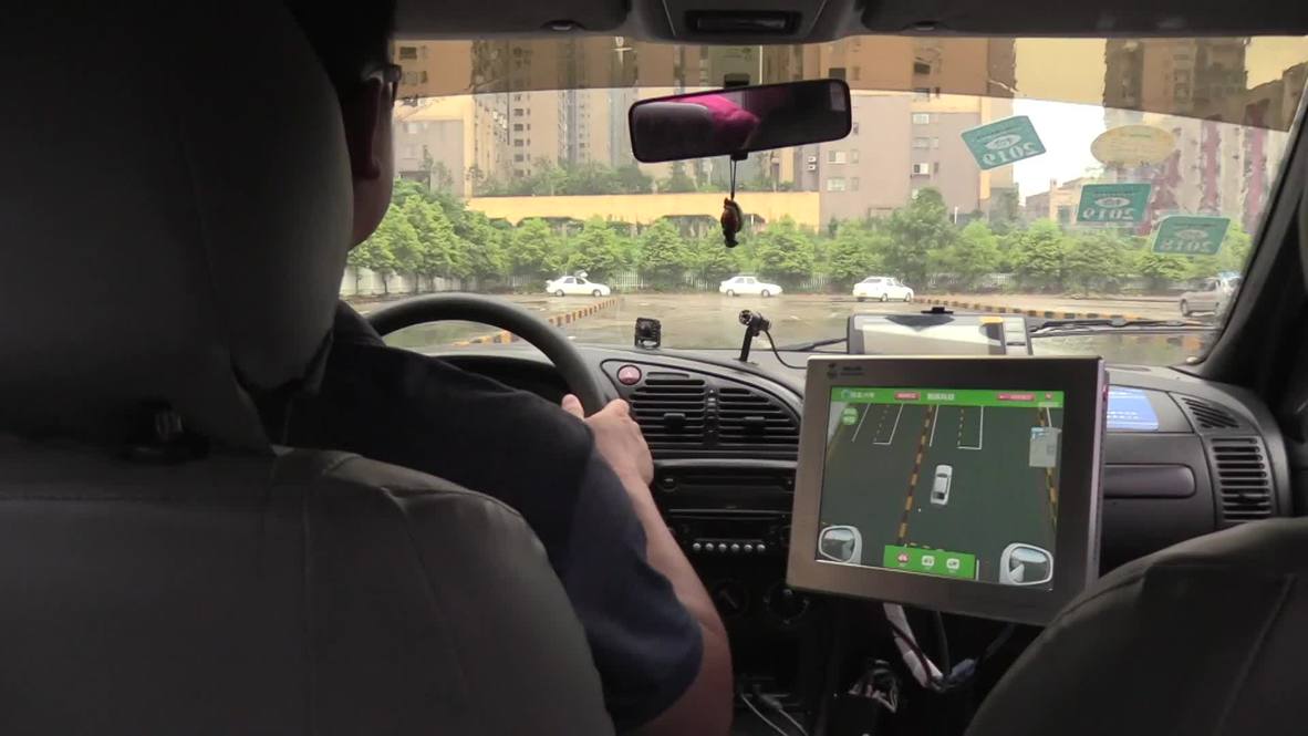 Robot instructor takes the wheel at Zhuzhou driving school
