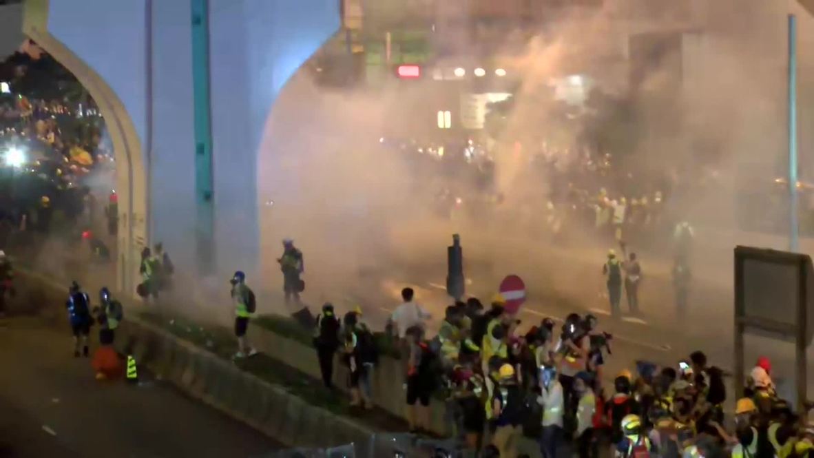 Hong Kong: Police fire tear gas at protesters as clashes erupt