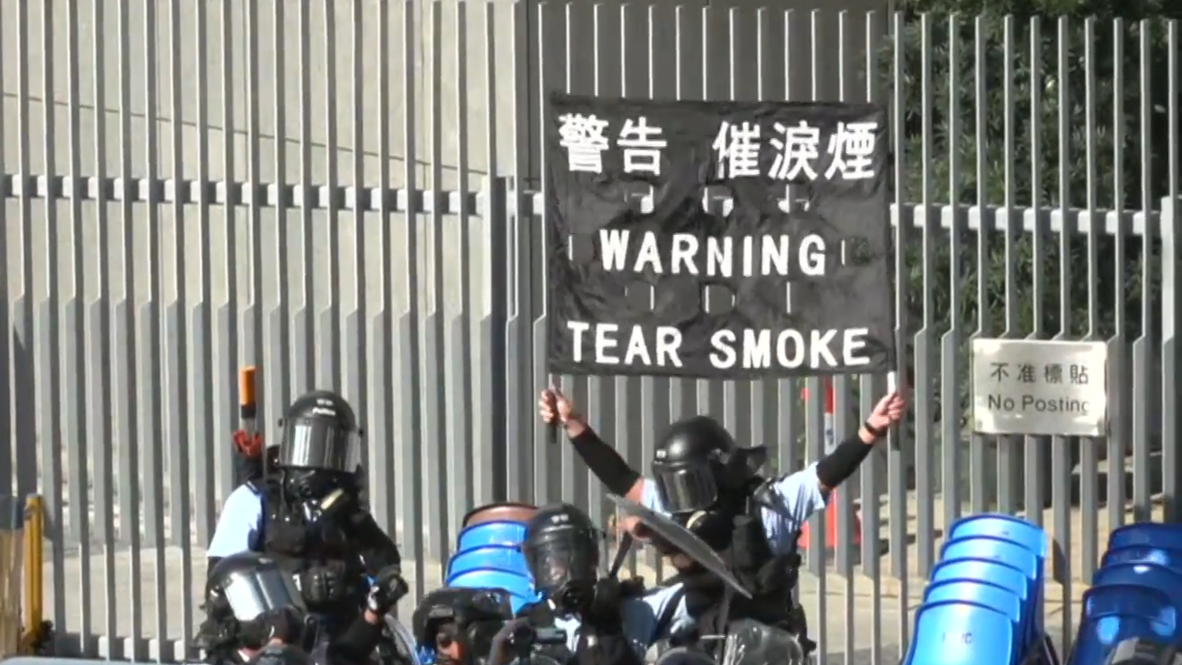 Hong Kong: Police fire tear gas on anti-government protesters