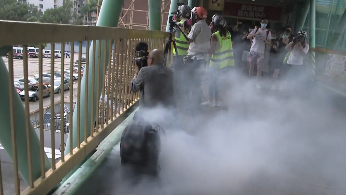 Hong Kong: Clashes break out as police fire tear gas at protesters