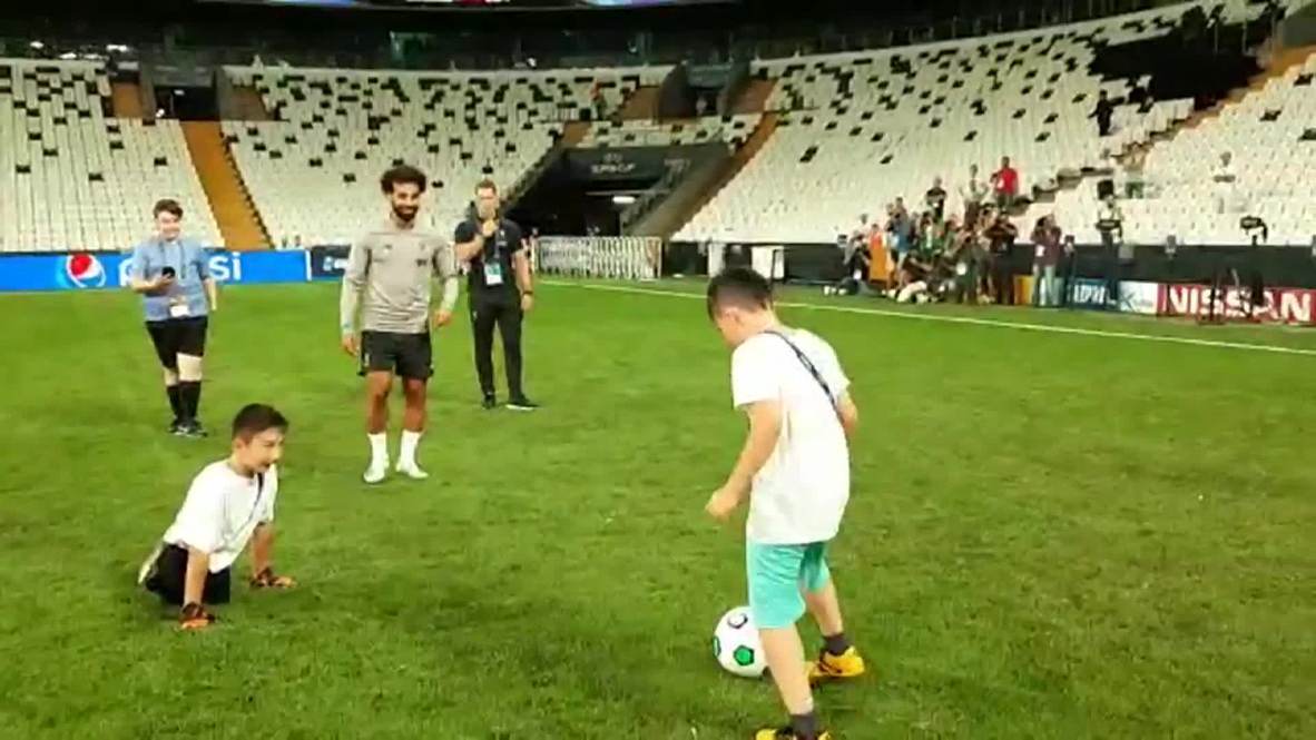 Turkey: Kazakh boy born without legs plays keepy-uppy with Mo Salah