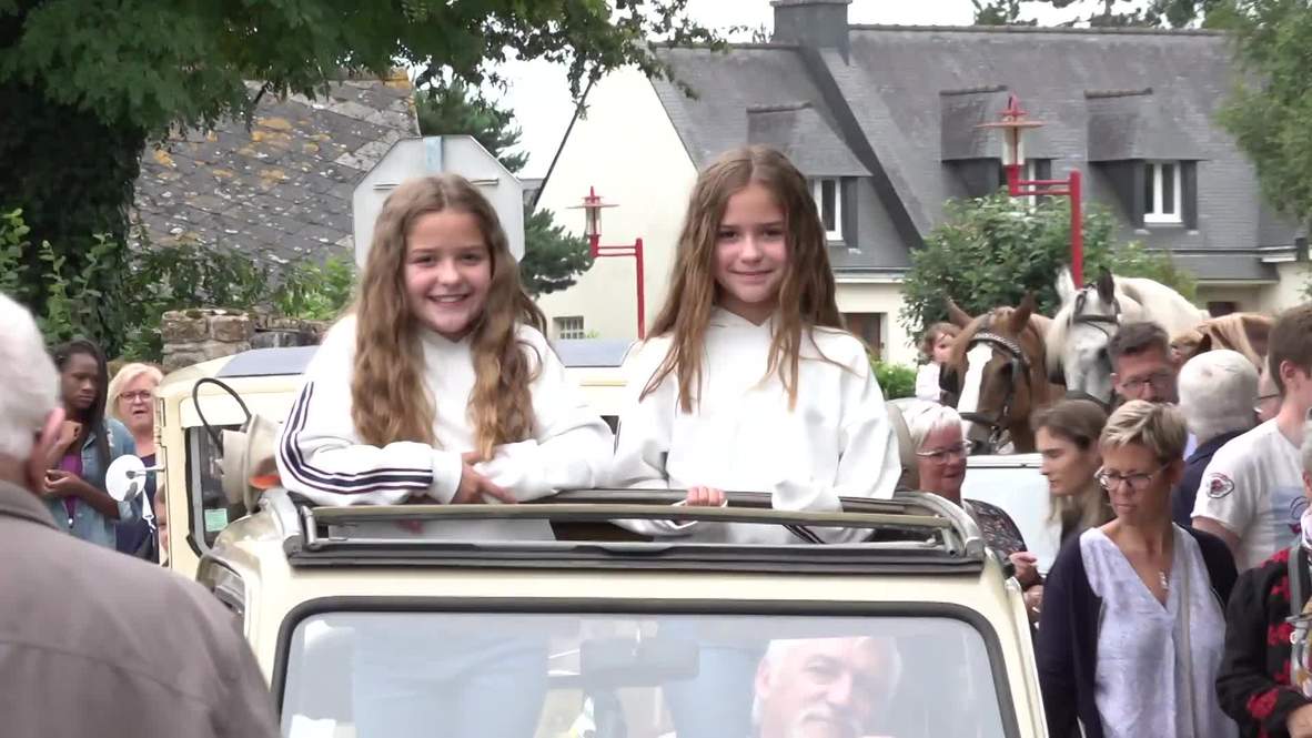 Seeing double! French twins' festival draws all number of identical siblings