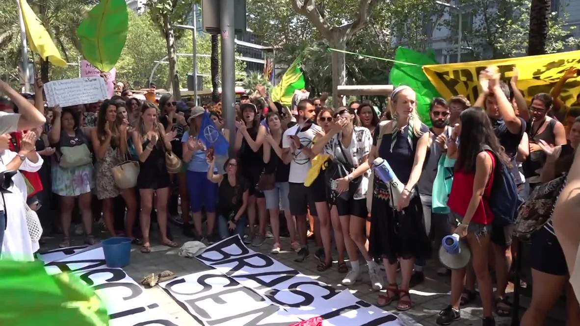 Spain: Protesters rally outside Brazilian consulate over Bolsonaro’s handling of wildfires