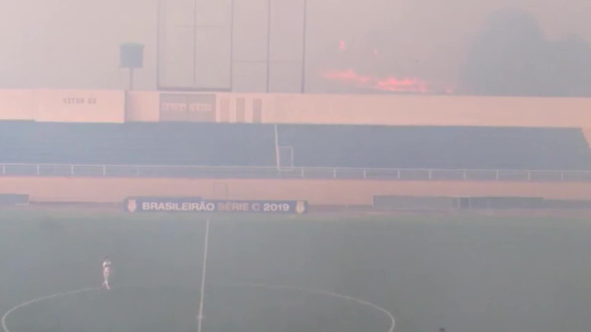 Brazil: Amazon rainforest fire interrupts football match