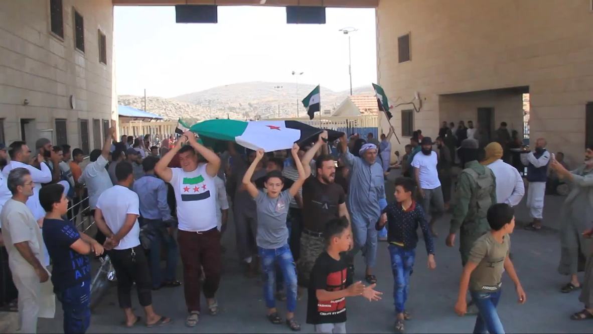 Syria: Hundreds of protesters try to storm Turkish border crossing in Idlib