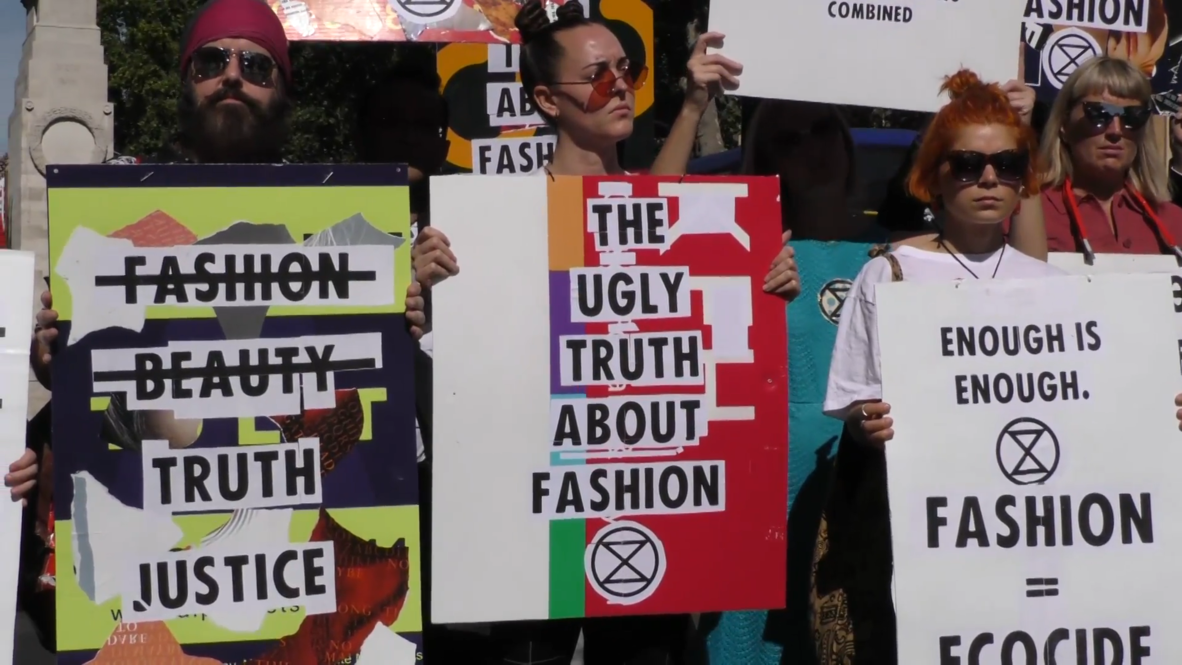 UK: Extinction Rebellion activists protest outside London Fashion Week venue