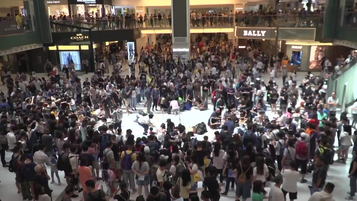 Hong Kong: Protesters rally at shopping centre for new round of demos