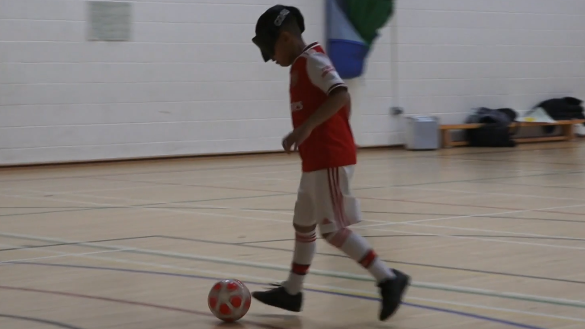 Nine-year-old Londoner Mikey lost eyesight but never lost passion for football
