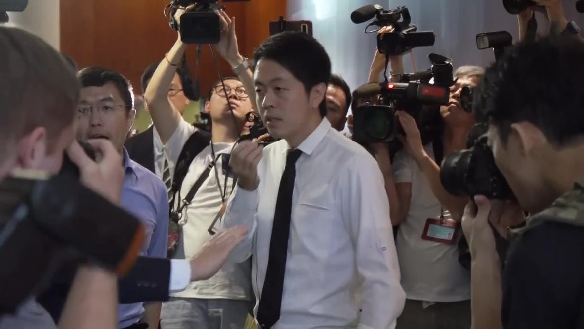 Hong Kong: Opposition lawmakers argue with LegCo security after removal from chamber