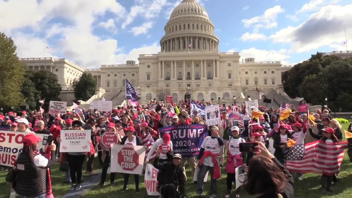 USA: Trump supporters rally outside Congress to demand end to impeachment push