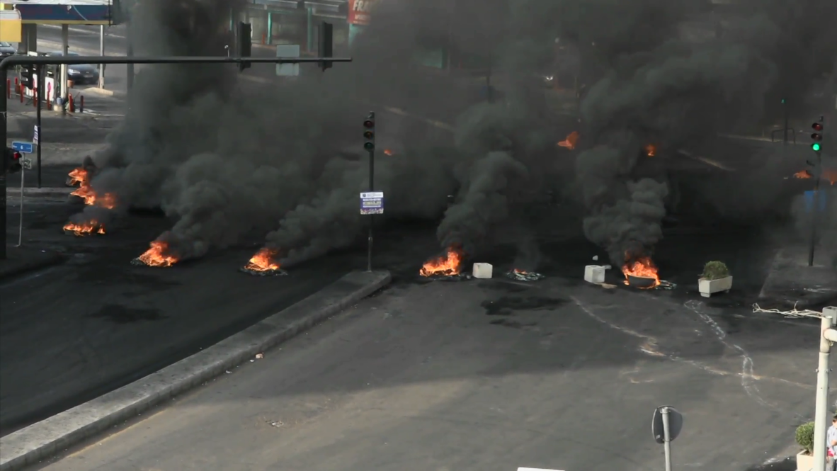 Lebanon: Fire on Beirut streets as anti-govt. protests enter second day