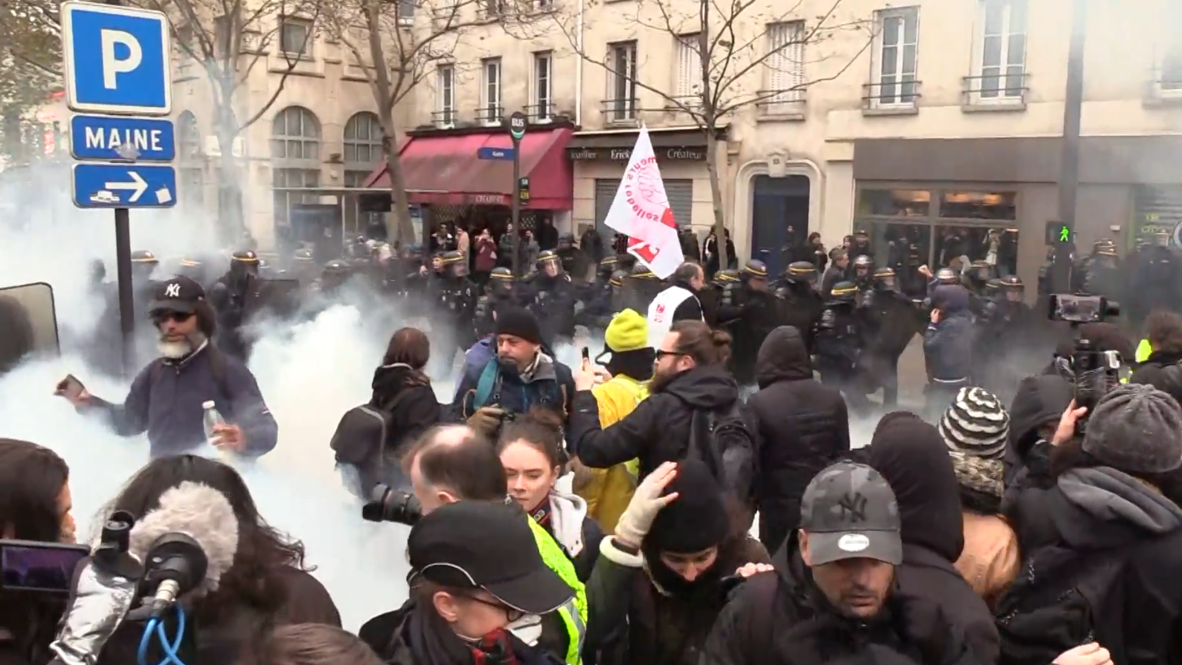 France: Police fire tear gas as 'Yellow Vests' join pension reform strike in Paris