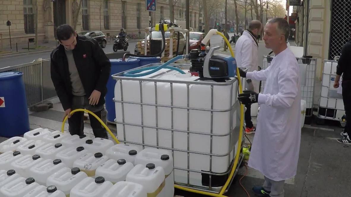 France: Paris pharmacy produces sanitiser in street to meet coronavirus demand
