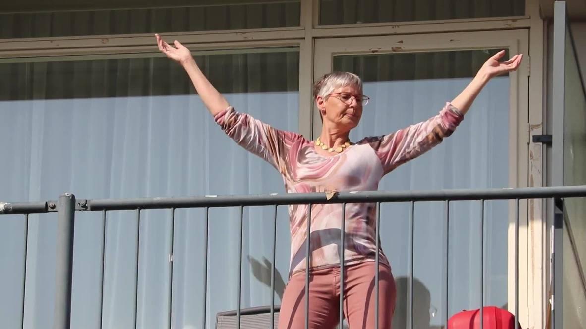Dutch nursing home residents and their relatives perform 'corona-proof' dance amid quarantine