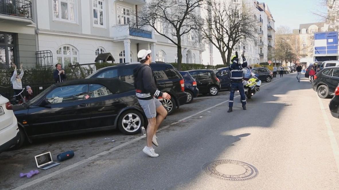 Germany: Hamburg trainer keeps people moving on balconies amid lockdown