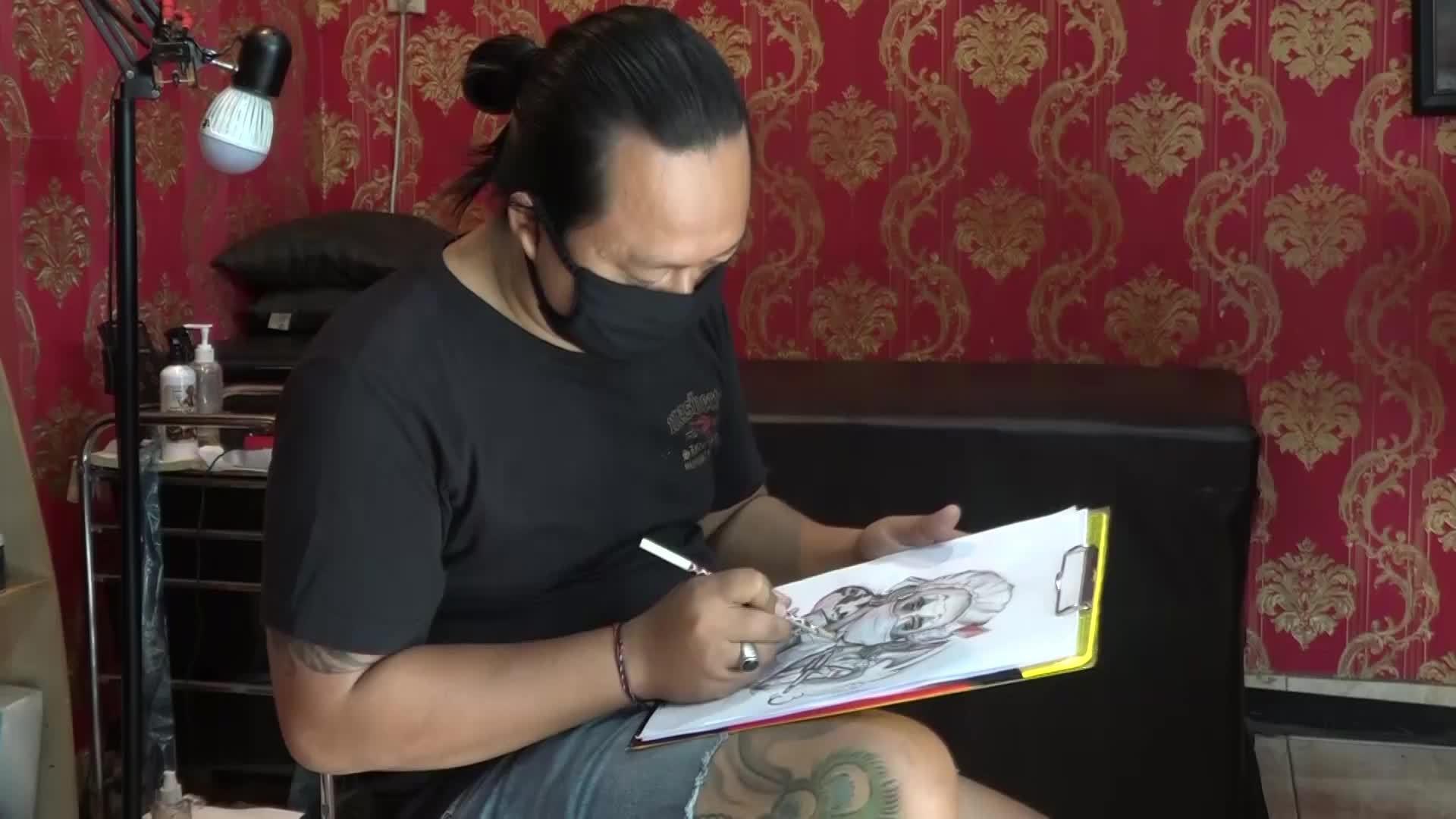Indonesia Man Immortalises Pandemic On His Skin With Coronavirus Themed Tattoo Video Ruptly