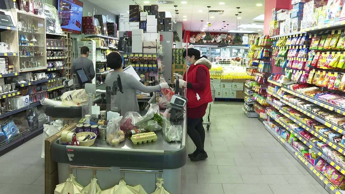 Austria: Shoppers adapt in Vienna as govt. enforces face masks amid coronavirus outbreak