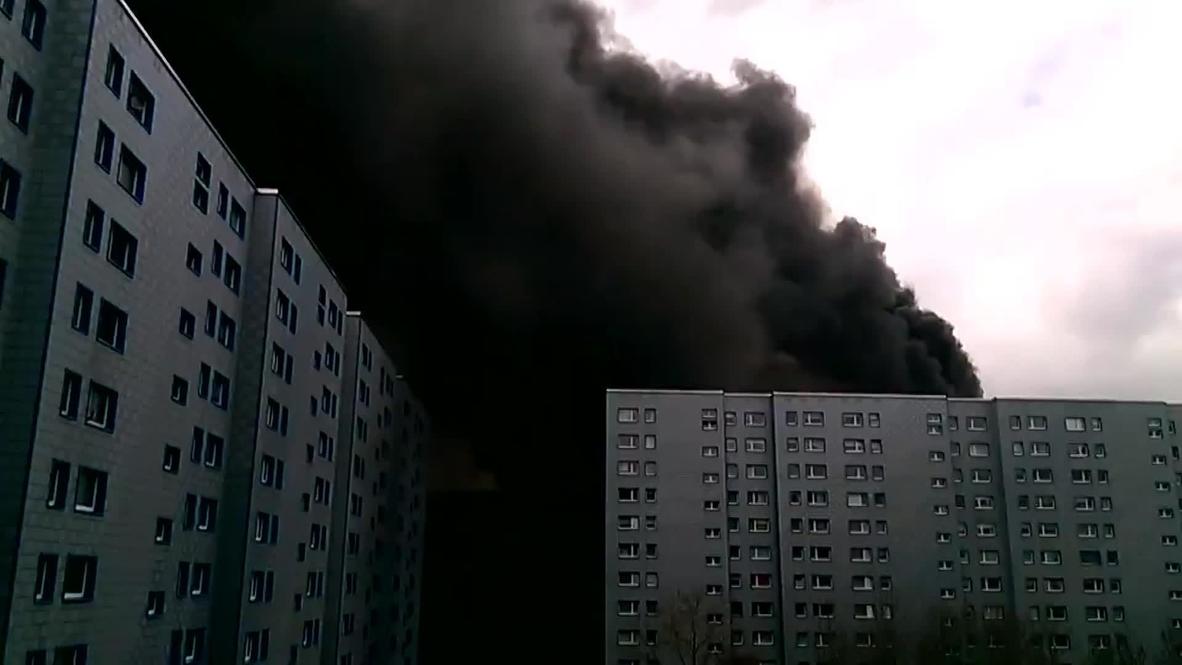 Germany: Cloud of smoke over Berlin's Lichtenberg as fire ravages residential buildings