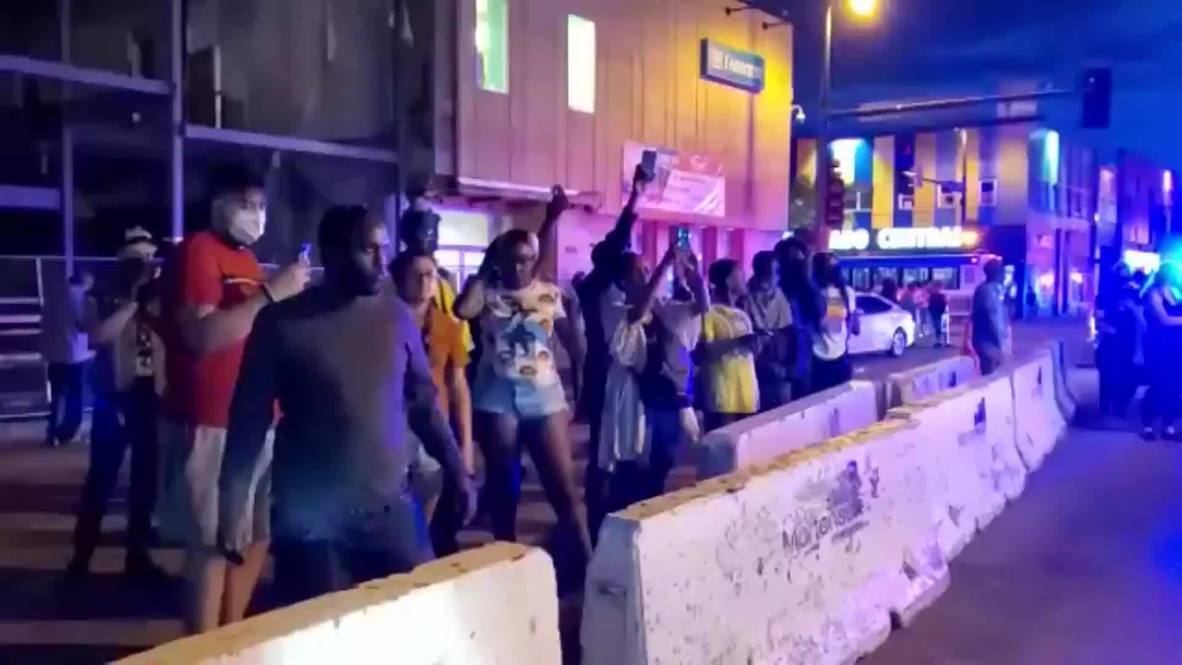 USA: Police block road following looting and protests over George Floyd's death in Minneapolis