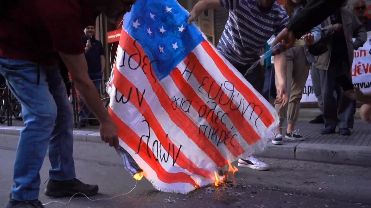 Greece: Protesters burn US flag outside consulate during rally for George Floyd
