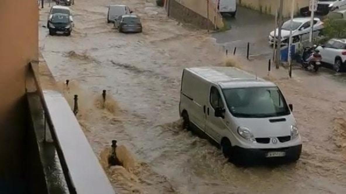 France: Vehicle struggles to drive on flooded Corsica street