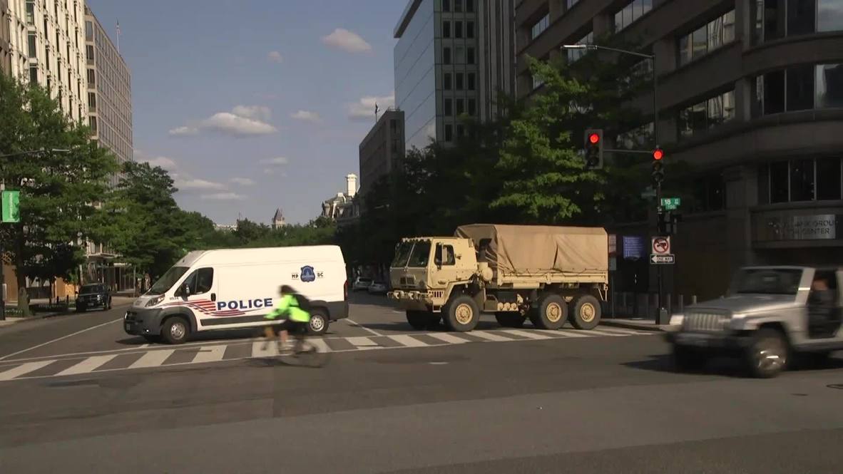 USA: Military vehicles secure the streets as protesters gather outside White House