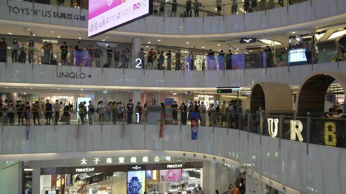 Hong Kong: Dozens hold pro-democracy rally inside shopping centre