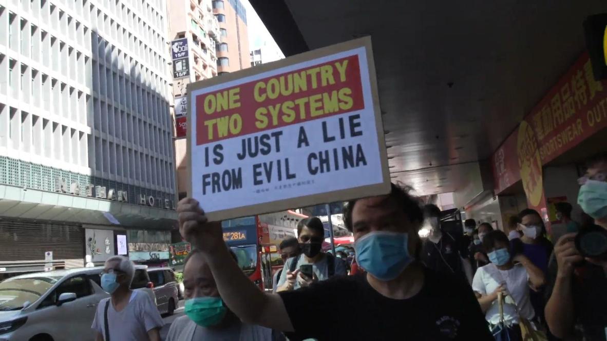 Hong Kong: Policía bloquea las calles mientras activistas tratan de llevar a cabo una protesta silenciosa