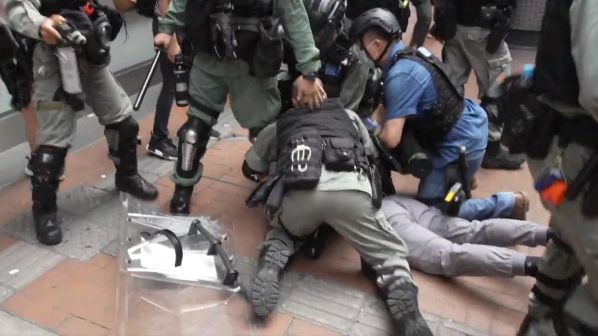 Hong Kong: Multiple arrests at unauthorised rally on anniversary of city’s handover