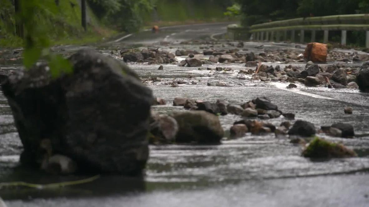 Japan: Mudslides caused by heavy rains block roads