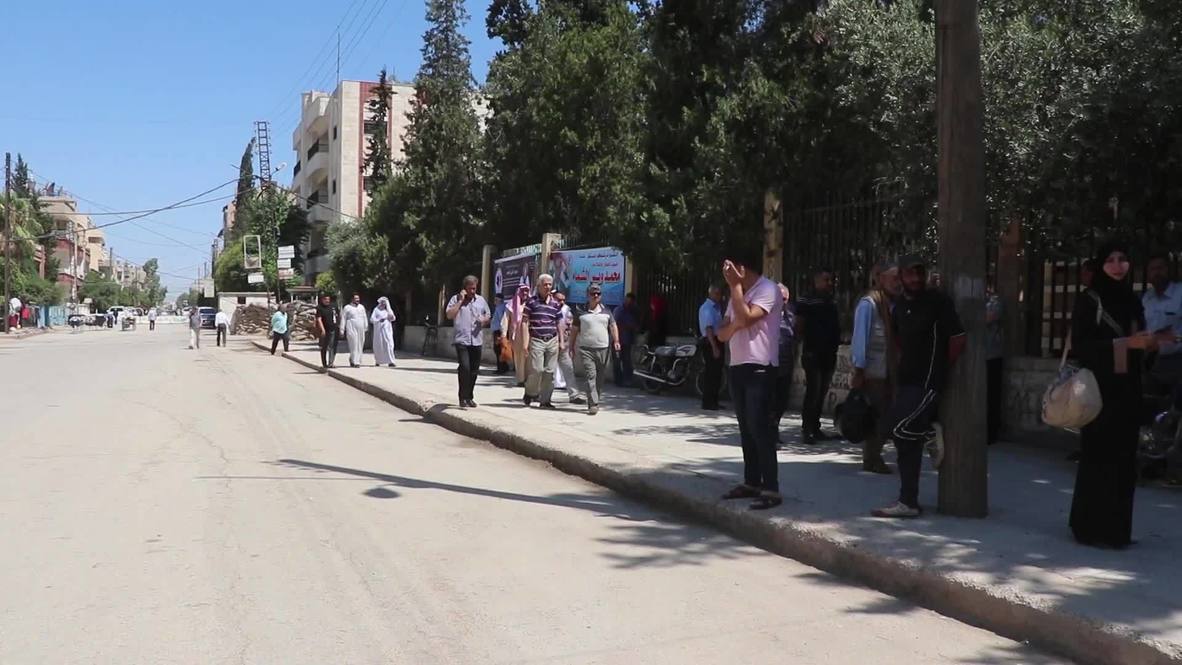 Syria: Protesters demand withdrawal of US and Turkish forces from country at Qamishli demo