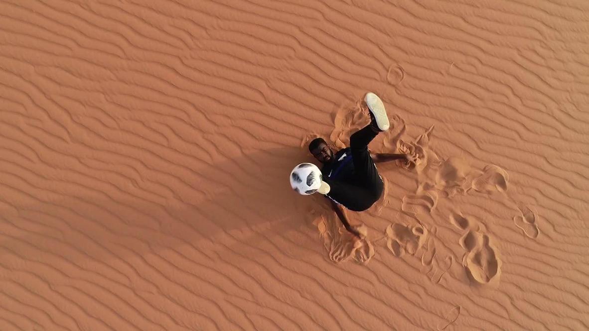 Modern tricks, ancient pitch! Sudanese freestyler shows his skills at Nubian Pyramids