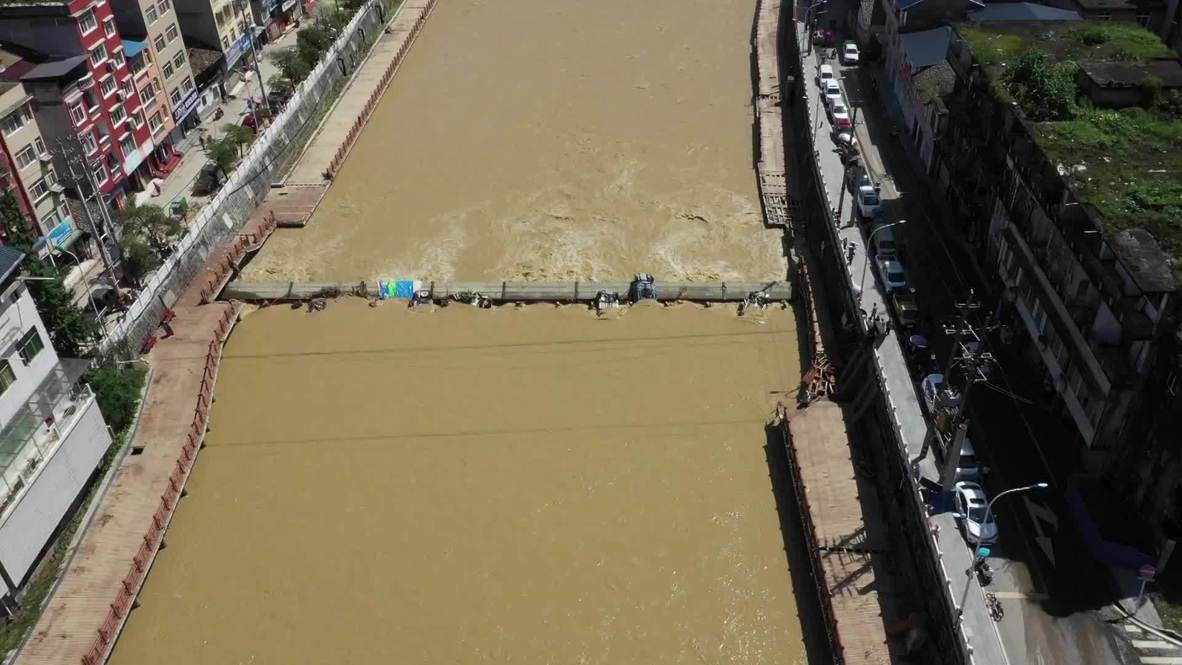 China: Emergency response level raised to highest as floods hit Enshi