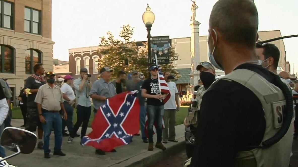 USA: Counter-protesters fly Confederate flag at BLM demo in Texas