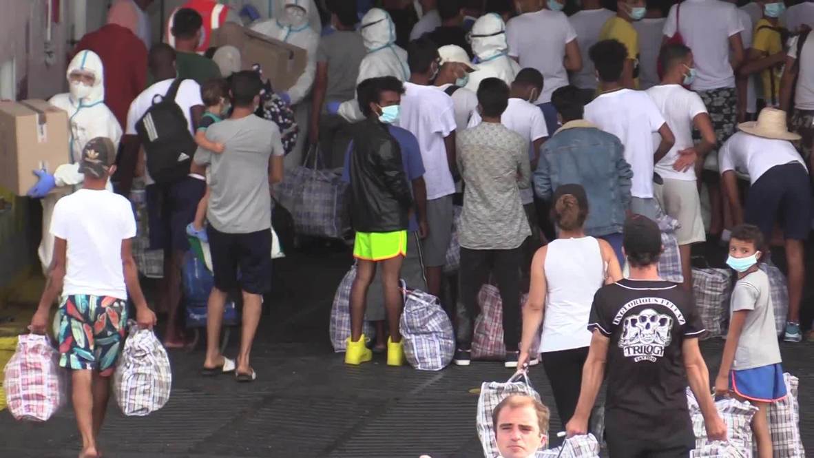 Italy: Migrants board GNV Azzurra vessel for mandatory quarantine in Lampedusa