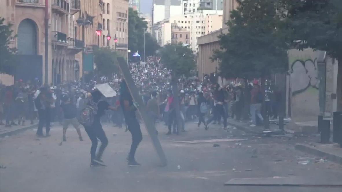 Lebanon: Thousands protest in Beirut as clashes with police turn violent