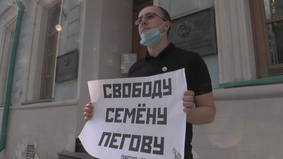 Россия: Пикеты в поддержку задержанных в Минске российских журналистов проходят в Москве