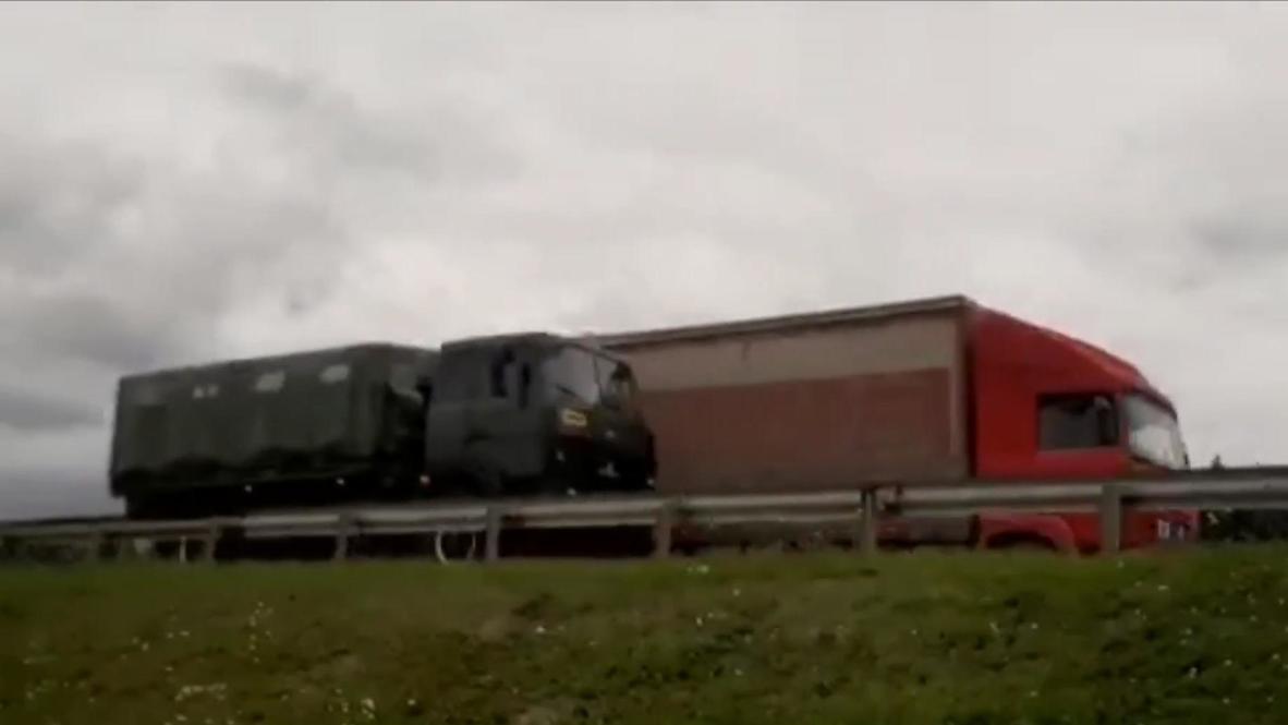 Belarus: Buses and military trucks stream towards Minsk